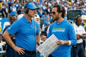 OC Mike McDaniel, Jim Harbaugh