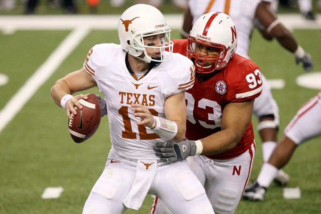 Colt McCoy, Texas, Nebraska, Michigan Wolverines clock